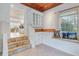 Cozy breakfast nook featuring custom built-ins and a window seat with decorative pillows at 958 Mikell Dr, Charleston, SC 29412