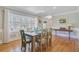 Bright dining room with natural light, wood floors, and a classic design at 958 Mikell Dr, Charleston, SC 29412