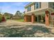 Elevated home with large brick supports and spacious driveway at 958 Mikell Dr, Charleston, SC 29412