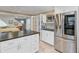 Modern kitchen featuring stainless steel appliances and white cabinetry at 958 Mikell Dr, Charleston, SC 29412