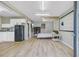 Studio apartment with a kitchenette, bed, and minimalist decor at 958 Mikell Dr, Charleston, SC 29412