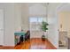 Bright office with a vaulted ceiling, hardwood floors, desk and plants at 958 Mikell Dr, Charleston, SC 29412