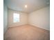 Bright bedroom with a carpeted floor and a window for natural light at 107 Goose Rd, Summerville, SC 29483