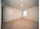 Bright bedroom featuring a closet, plush carpeting, and a window for natural light at 107 Goose Rd, Summerville, SC 29483