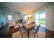 Dining area with table, chairs, and sliding doors to the backyard at 107 Goose Rd, Summerville, SC 29483