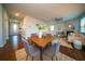 Inviting dining area with wood floors and views to the living room at 107 Goose Rd, Summerville, SC 29483