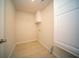 Functional laundry room with tile flooring and built-in cabinet at 107 Goose Rd, Summerville, SC 29483