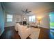 Comfortable living room with a fireplace, ceiling fan and views of the back yard at 107 Goose Rd, Summerville, SC 29483