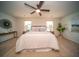 Inviting main bedroom with a ceiling fan, ample natural light, and stylish decor at 107 Goose Rd, Summerville, SC 29483