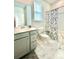 Clean bathroom featuring white cabinets, sink, toilet, and bathtub-shower with modern finishes at 114 E Respite Ln, Summerville, SC 29483