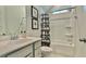 Bright bathroom featuring a shower-tub combination with modern fixtures and black and white curtain at 114 E Respite Ln, Summerville, SC 29483