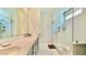 This bathroom has a double sink vanity and a tiled shower at 114 E Respite Ln, Summerville, SC 29483