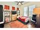 Cozy bedroom with natural light, featuring a TV, and decorative furniture at 114 E Respite Ln, Summerville, SC 29483