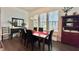 Cozy dining room with hardwood floors, chandelier lighting and classic decor at 114 E Respite Ln, Summerville, SC 29483