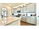 Modern kitchen featuring gray cabinets, stainless steel appliances, and a quartz countertop island at 114 E Respite Ln, Summerville, SC 29483