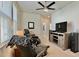 Inviting living room space featuring a modern entertainment center and comfortable, plush seating at 114 E Respite Ln, Summerville, SC 29483