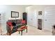 Comfortable sitting room with seating and cabinet storage at 114 E Respite Ln, Summerville, SC 29483
