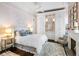 Comfortable bedroom with a fireplace, sitting chair, and large closet at 115 Rutledge Ave # A, Charleston, SC 29401