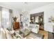 Bright living room featuring a decorative ceiling, chandelier and elegant decor at 115 Rutledge Ave # A, Charleston, SC 29401
