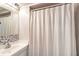 Cozy bathroom with a shower tub combo, white tile and white vanity at 12 Dune Crest Trace Trl, Seabrook Island, SC 29455