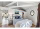 Comfortable bedroom features a view of another room and ensuite bathroom access at 12 Dune Crest Trace Trl, Seabrook Island, SC 29455