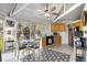 Bright kitchen area with neutral cabinetry, modern appliances, and adjacent dining area at 12 Dune Crest Trace Trl, Johns Island, SC 29455