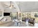 Bright living room with vaulted ceilings, lots of windows, and serene water views at 12 Dune Crest Trace Trl, Seabrook Island, SC 29455