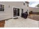 Concrete backyard patio with a grill, sliding glass door, and vinyl siding at 122 Moon Shadow Ln, Summerville, SC 29485