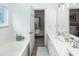 Bright bathroom featuring double sinks with a view into the bedroom, creating a convenient layout at 122 Moon Shadow Ln, Summerville, SC 29485