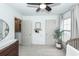 Bedroom with a changing table, crib, neutral walls, and window with light-filtering curtains at 122 Moon Shadow Ln, Summerville, SC 29485