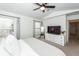 A bedroom with a view, featuring neutral decor and a ceiling fan for added comfort at 122 Moon Shadow Ln, Summerville, SC 29485