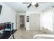 Bedroom with neutral carpet, ceiling fan, closet, and doorway leading to the rest of the house at 122 Moon Shadow Ln, Summerville, SC 29485