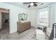 Lovely Bedroom with dresser and large window creating a serene and well-organized space at 122 Moon Shadow Ln, Summerville, SC 29485