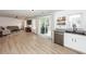 Spacious living room with hardwood floors, stylish decor, and sliding glass doors at 122 Moon Shadow Ln, Summerville, SC 29485