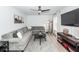 Comfortable living room with ceiling fan, stylish furniture, neutral rug and media console at 122 Moon Shadow Ln, Summerville, SC 29485