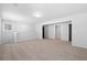 Spacious finished basement with neutral carpet, trim, and ample natural light at 128 Surfbird Rd, Summerville, SC 29486