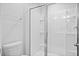 Bright bathroom featuring a glass shower, chrome fixtures, and modern toilet at 128 Surfbird Rd, Summerville, SC 29486