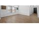 Bright dining area with wood flooring, wainscoting, and natural light from large window at 128 Surfbird Rd, Summerville, SC 29486