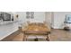 Dining room showcases a rustic wooden table, seating for six, and hardwood flooring at 131 Horizon Ridge Dr, Summerville, SC 29486