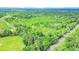 Scenic aerial view of lush, mature forestland with a clear blue sky above at 13959 Cottageville Hwy, Cottageville, SC 29435