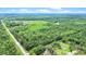 Lush, mature forestland with a house situated in a clearing, accessible by road at 13959 Cottageville Hwy, Cottageville, SC 29435