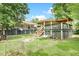 Inviting backyard with deck, gazebo, and fire pit, perfect for outdoor gatherings at 13959 Cottageville Hwy, Cottageville, SC 29435