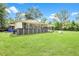 Well-maintained backyard with a large deck, ideal for entertaining and relaxing at 13959 Cottageville Hwy, Cottageville, SC 29435