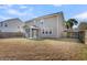 Spacious backyard with a screened porch and fenced-in yard offers privacy and outdoor living at 146 Education Blvd, Ladson, SC 29456