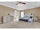 Spacious carpeted main bedroom with neutral walls, tray ceiling and whitewashed bed frame at 146 Education Blvd, Ladson, SC 29456