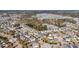 Expansive aerial view of a residential neighborhood featuring well-manicured lawns and community lakes at 1525 Harriman St, Mount Pleasant, SC 29466