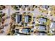 An aerial view of a residential area showcasing well-maintained homes, lush landscaping, and quiet neighborhood streets at 1525 Harriman St, Mount Pleasant, SC 29466