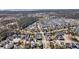 Scenic aerial view of a residential area showcasing the neighborhood's layout and tree-lined streets at 1525 Harriman St, Mount Pleasant, SC 29466