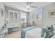 Bright bedroom featuring serene wall color, ceiling fan, and windows allowing for natural light at 1525 Harriman St, Mount Pleasant, SC 29466