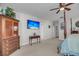 Spacious bedroom features ceiling fan, a mounted TV, and an adjacent doorway and closet at 1525 Harriman St, Mount Pleasant, SC 29466